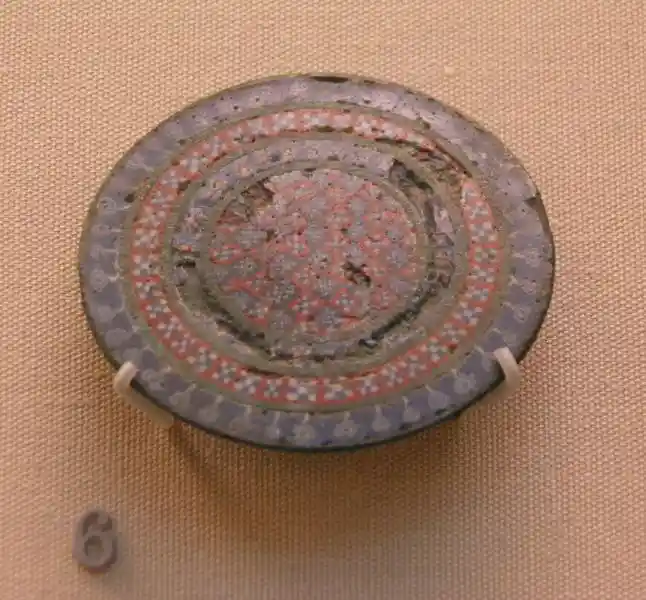 Brooch, squares forming cross, sun disc, solar disc